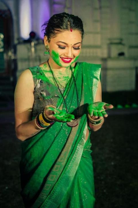 photo of girl playing holi